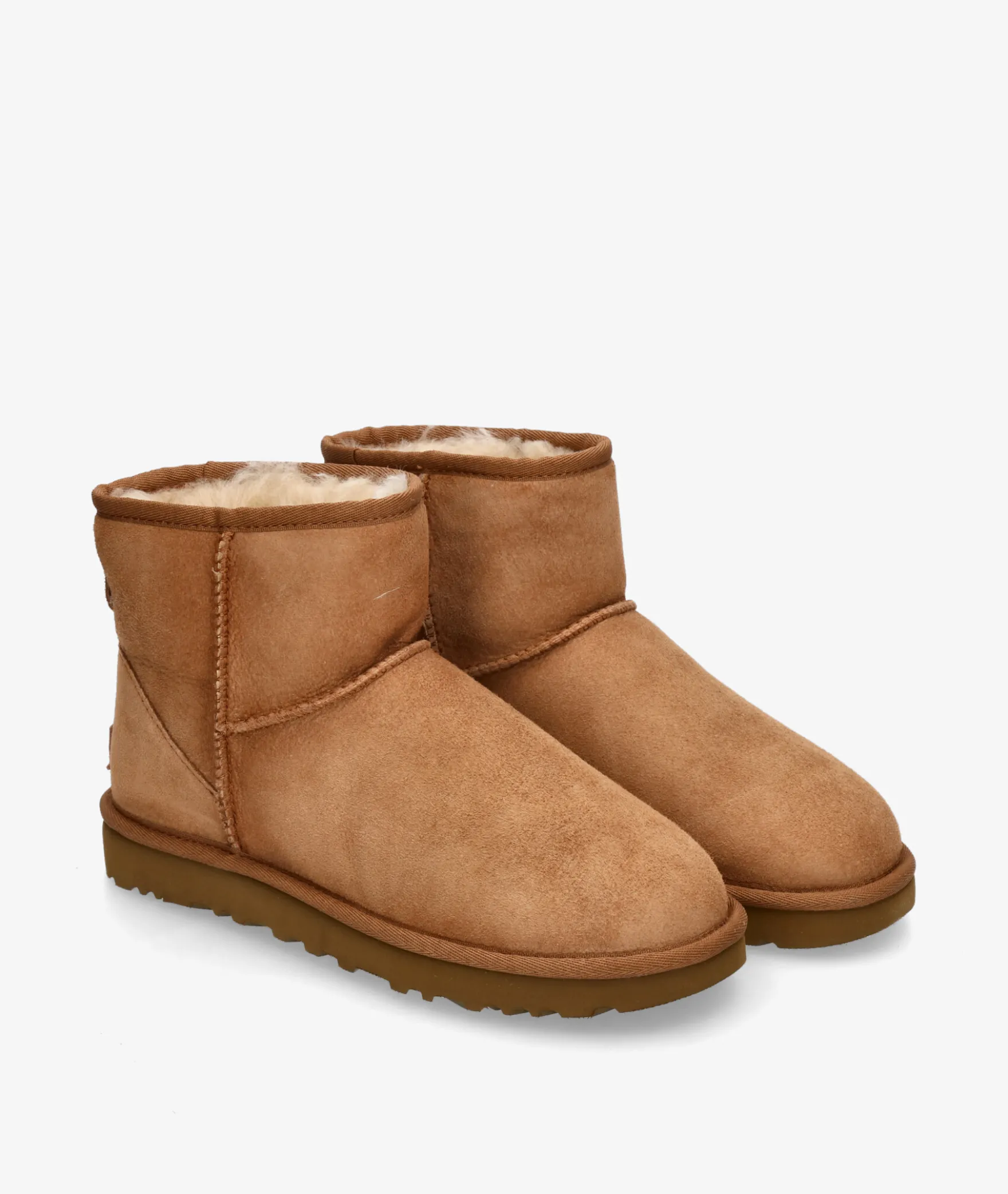 Botines UGGCLASSIC MINI II en cuero